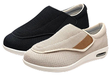 Two slip-on shoes, one black and one beige, with mesh fabric and white soles.