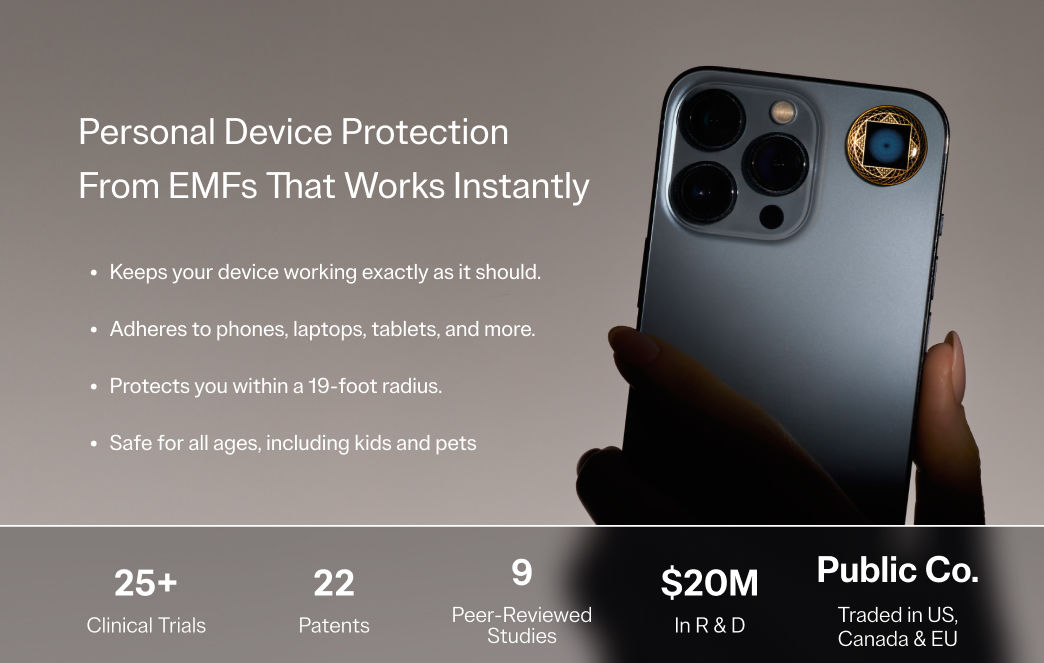 Hand holding a smartphone with text about EMF protection.