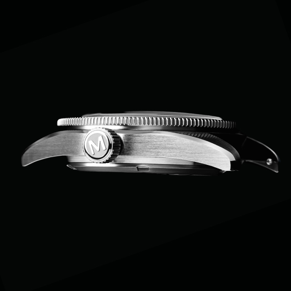 Side view of a metallic wristwatch on a black background.