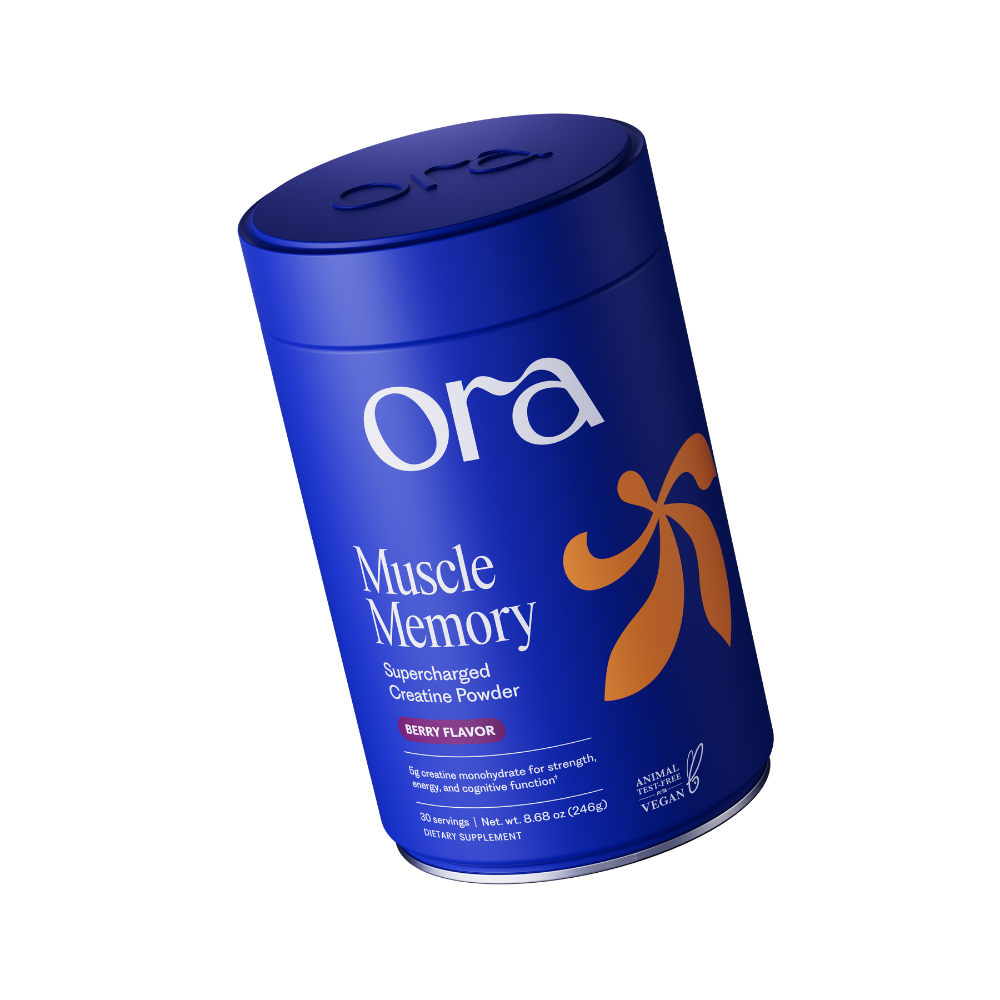 Blue container of Ora Muscle Memory creatine powder.