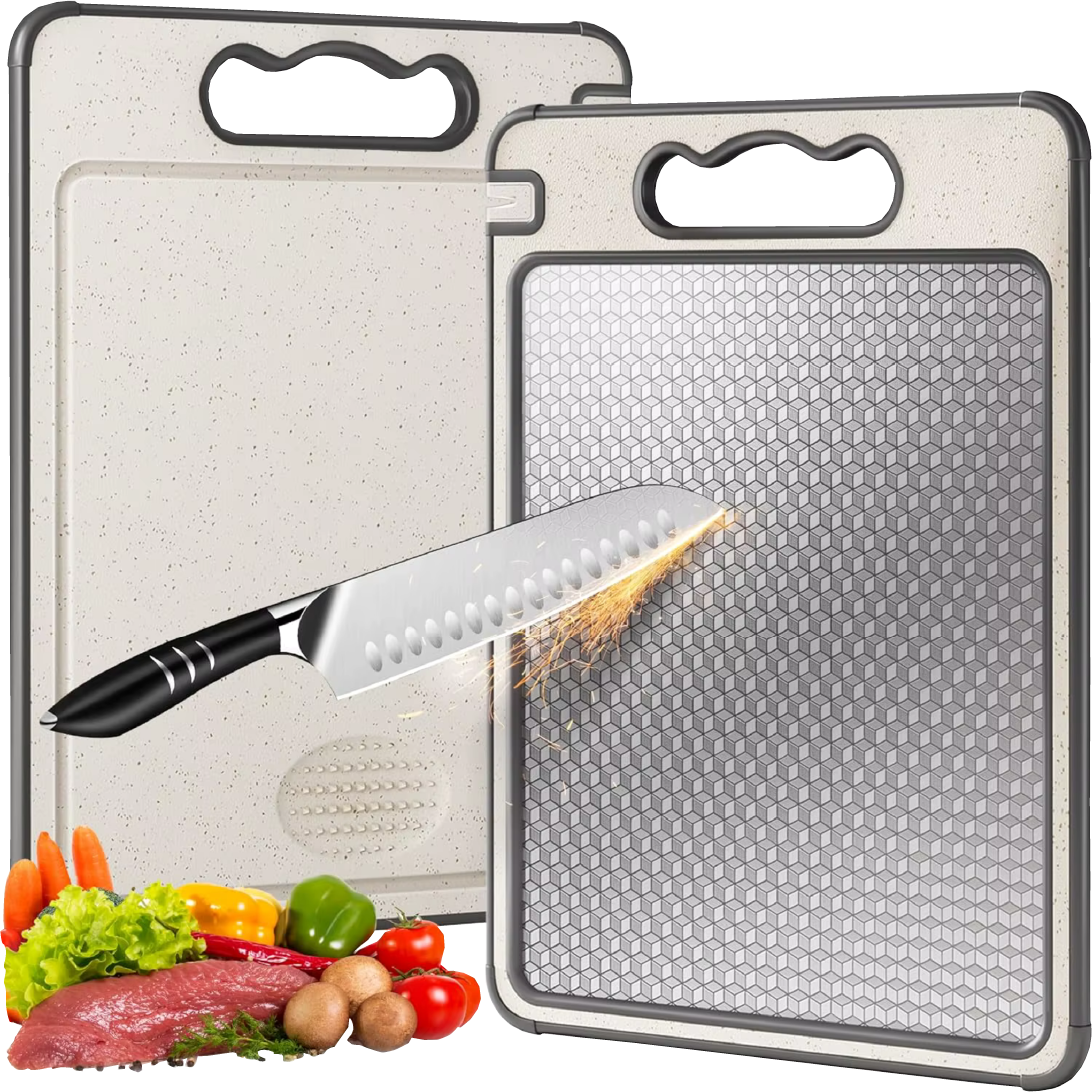 Two cutting boards, a knife, and assorted vegetables and meat.