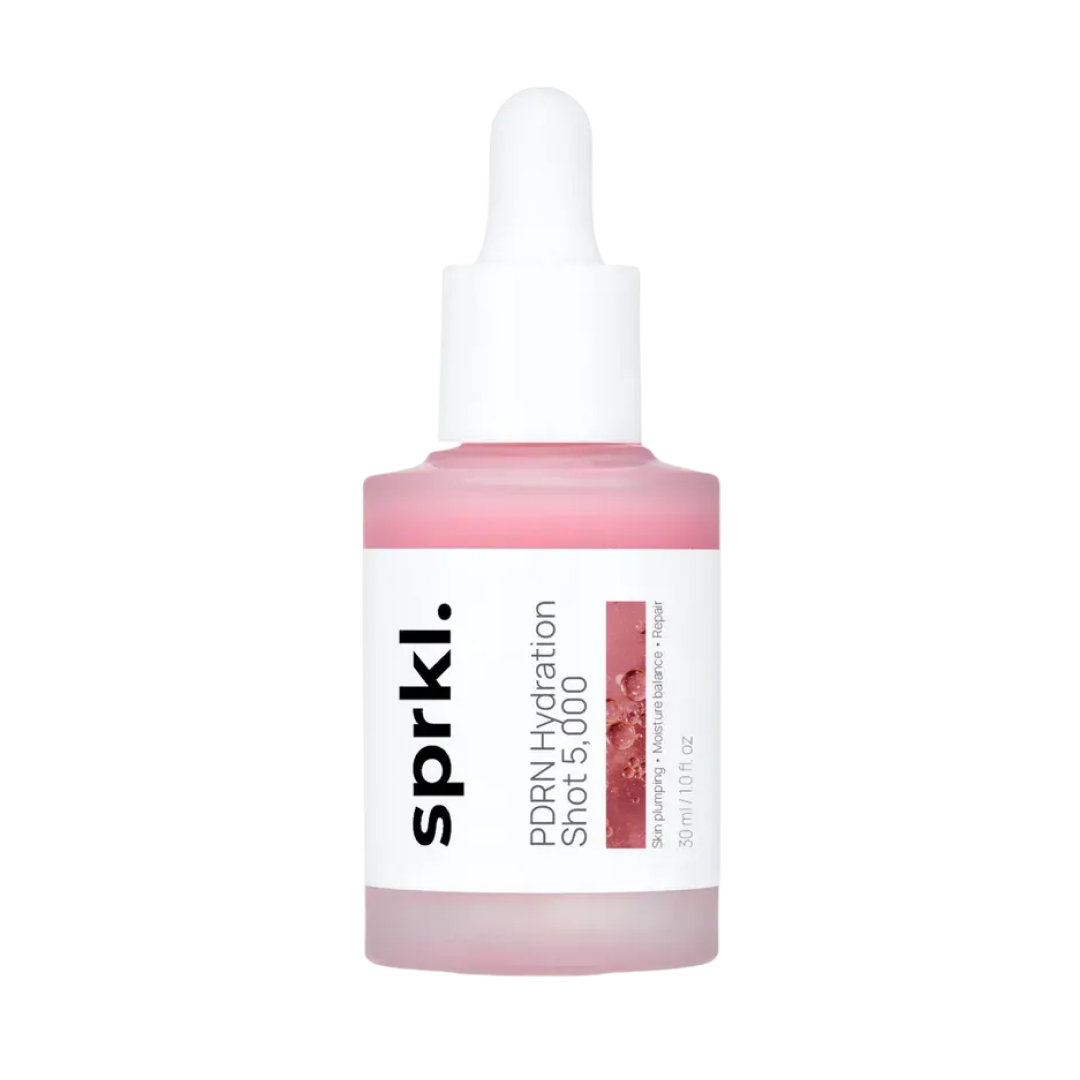 Pink dropper bottle labeled 'SPRK. PDRN Hydration Shot 5,000'.