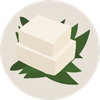 An illustration of two blocks of tofu stacked on green leaves on a circular plate.
