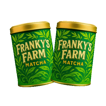 Two green tins labeled 'Franky's Farm Matcha' with leaf designs.