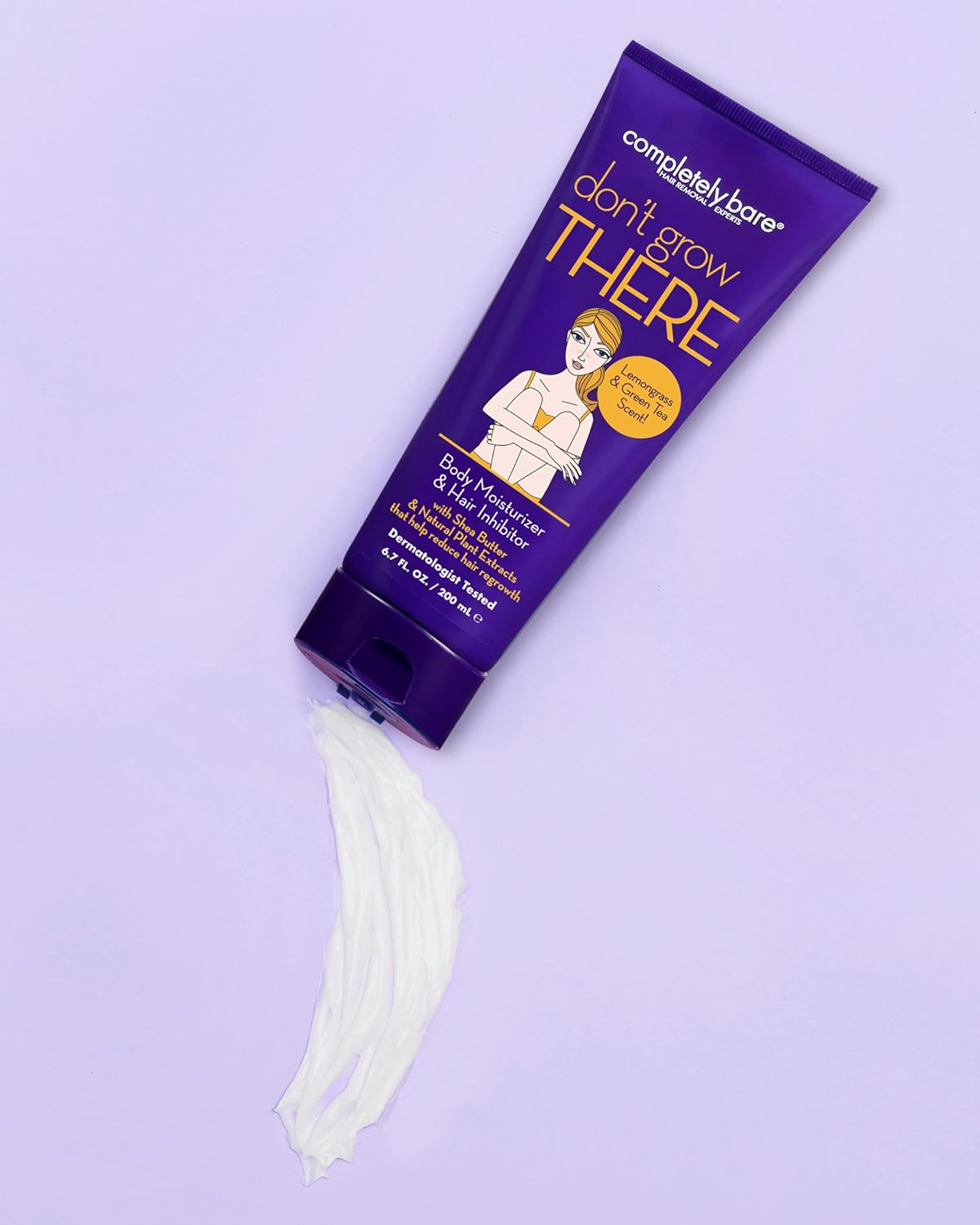 A purple tube of Completely Bare body moisturizer with a smear of white lotion on a lavender background.