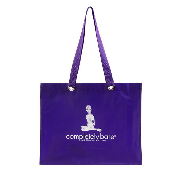 A purple tote bag with the white 'completely bare HAIR REMOVAL EXPERTS' logo on the front.