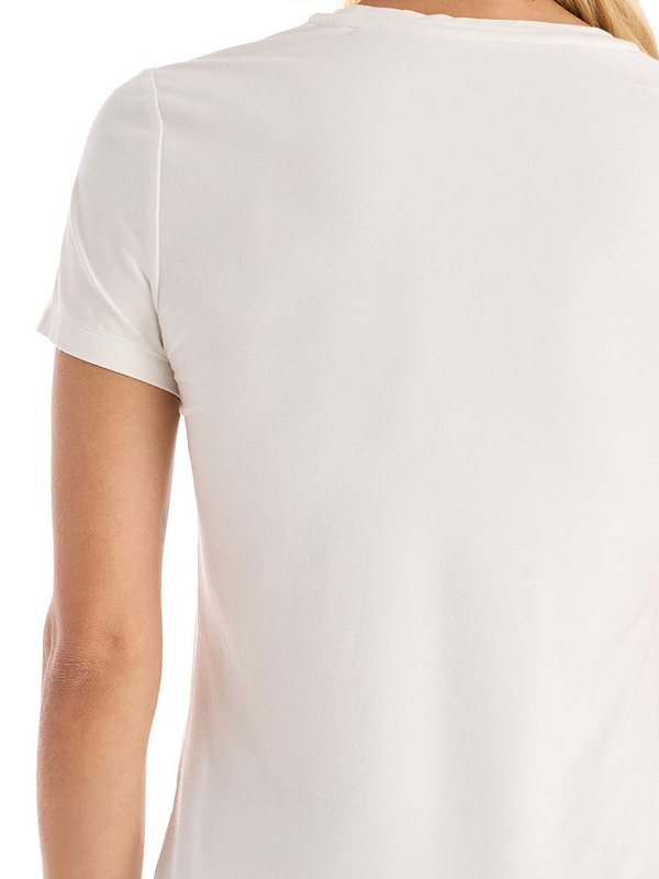 Back view of a person wearing a plain white t-shirt.