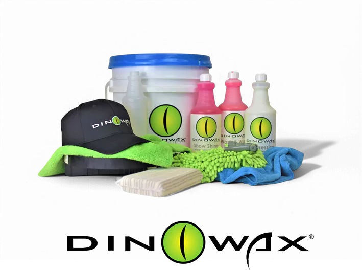 Car detailing products including bottles, bucket, cloths, brush, and a cap with 'Dinowax' logo.