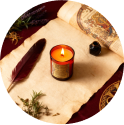 Lit candle on old paper with feather and ink, surrounded by herbs.