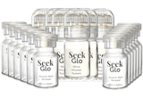 Multiple bottles of 'Seek Glo' white perfume arranged in rows.