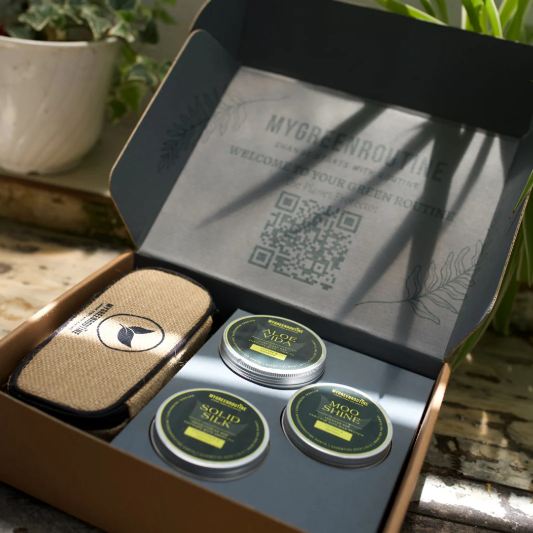 Open box with eco-friendly products and a QR code inside.