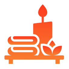 An orange icon of a lit candle, folded towels, and a lotus flower on a small shelf.