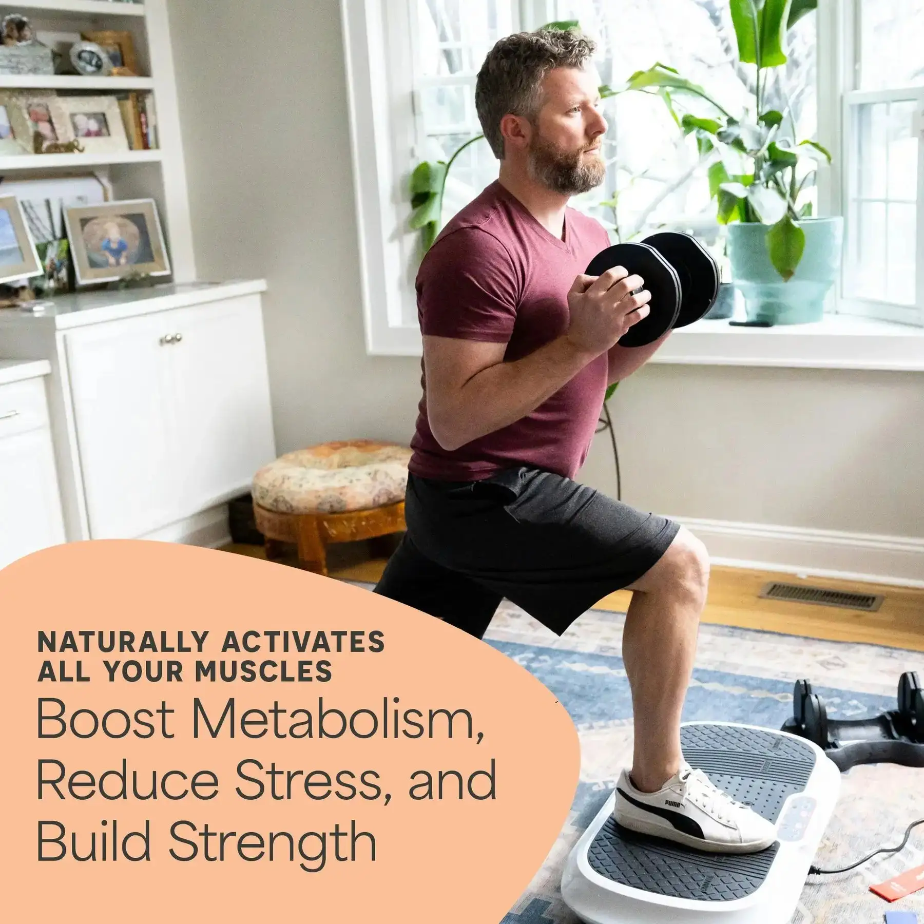 Man exercising with weights on a vibration plate at home, with motivational text.