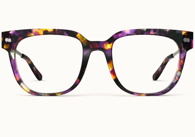 A pair of eyeglasses with thick, square frames in a purple and yellow tortoiseshell pattern.