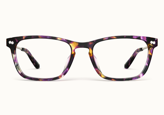 A pair of eyeglasses with purple, yellow, and black tortoiseshell frames, seen from the front.