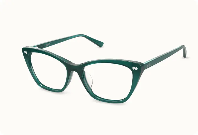 A pair of dark green, cat-eye style eyeglasses against a white background.