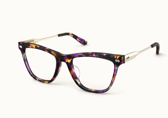 A pair of cat-eye eyeglasses with a purple and yellow tortoiseshell pattern and thin metal arms.