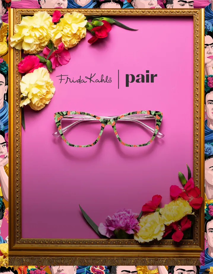 Colorful floral eyeglasses displayed on a pink background with flowers and a golden frame.