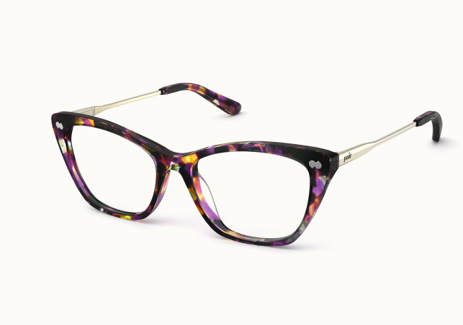 A pair of multi-colored purple, yellow, and black cat-eye glasses with thin metal arms.