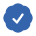 A pixelated blue circle with a black checkmark inside it.