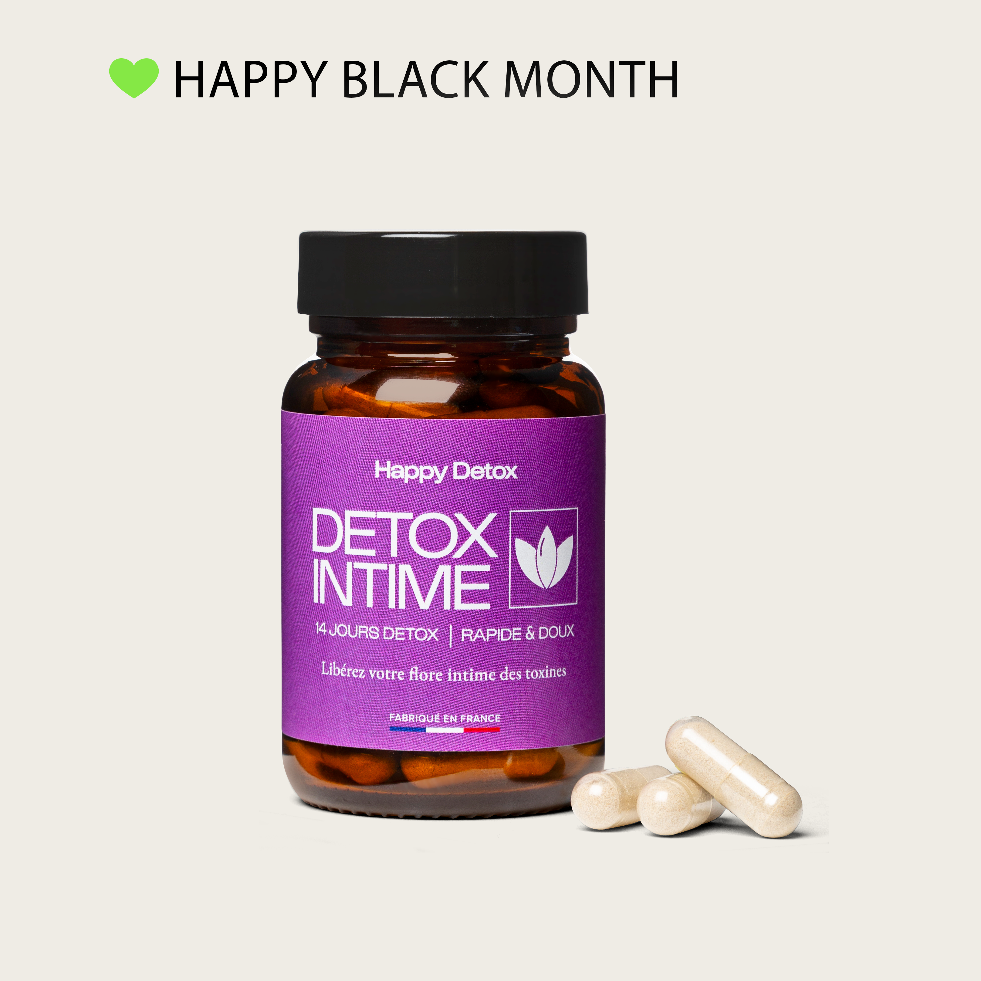 Purple-labeled detox supplement bottle with capsules and 'Happy Black Month' text above.