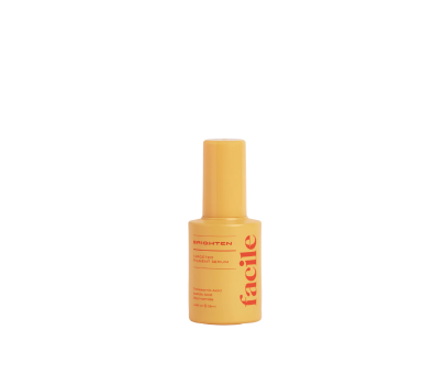 Yellow bottle with 'facile' and 'BRIGHTEN' text on it.