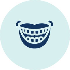 Icon of a smiling mouth with braces on a light blue background.