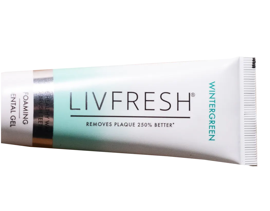 Tube of LivFresh foaming dental gel, wintergreen flavor.