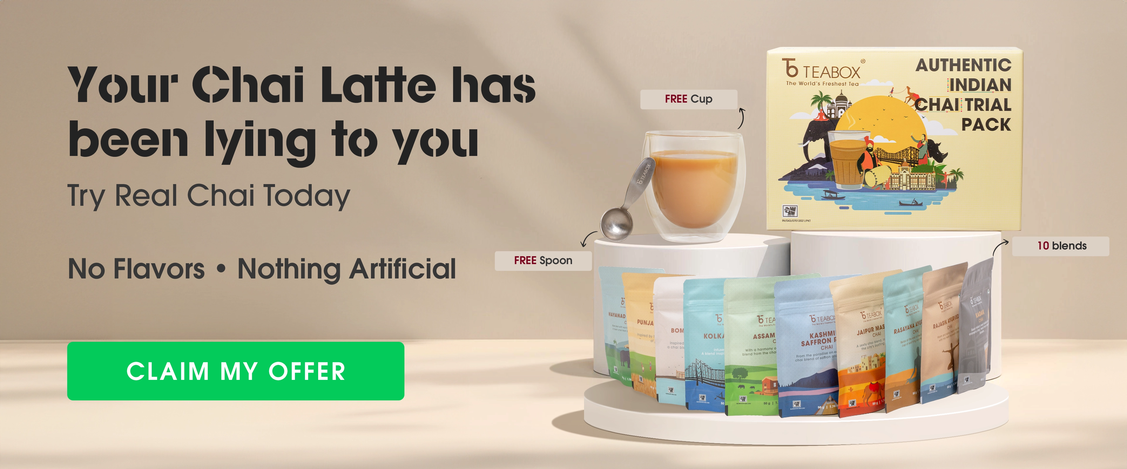 Teabox advertising a trial pack with 10 chai varieties, cup, and tea spoon.