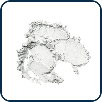 A textured, irregularly shaped white powder on a white background.