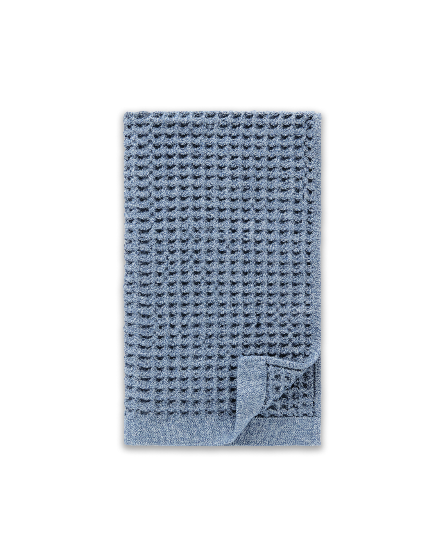 A blue waffle-weave towel, folded with the bottom right corner turned up, against a white background.