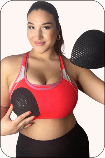 Woman holding Half Moon Bra Inserts