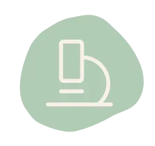 A white line art icon of a microscope on a light green, amorphous blob-shaped background.
