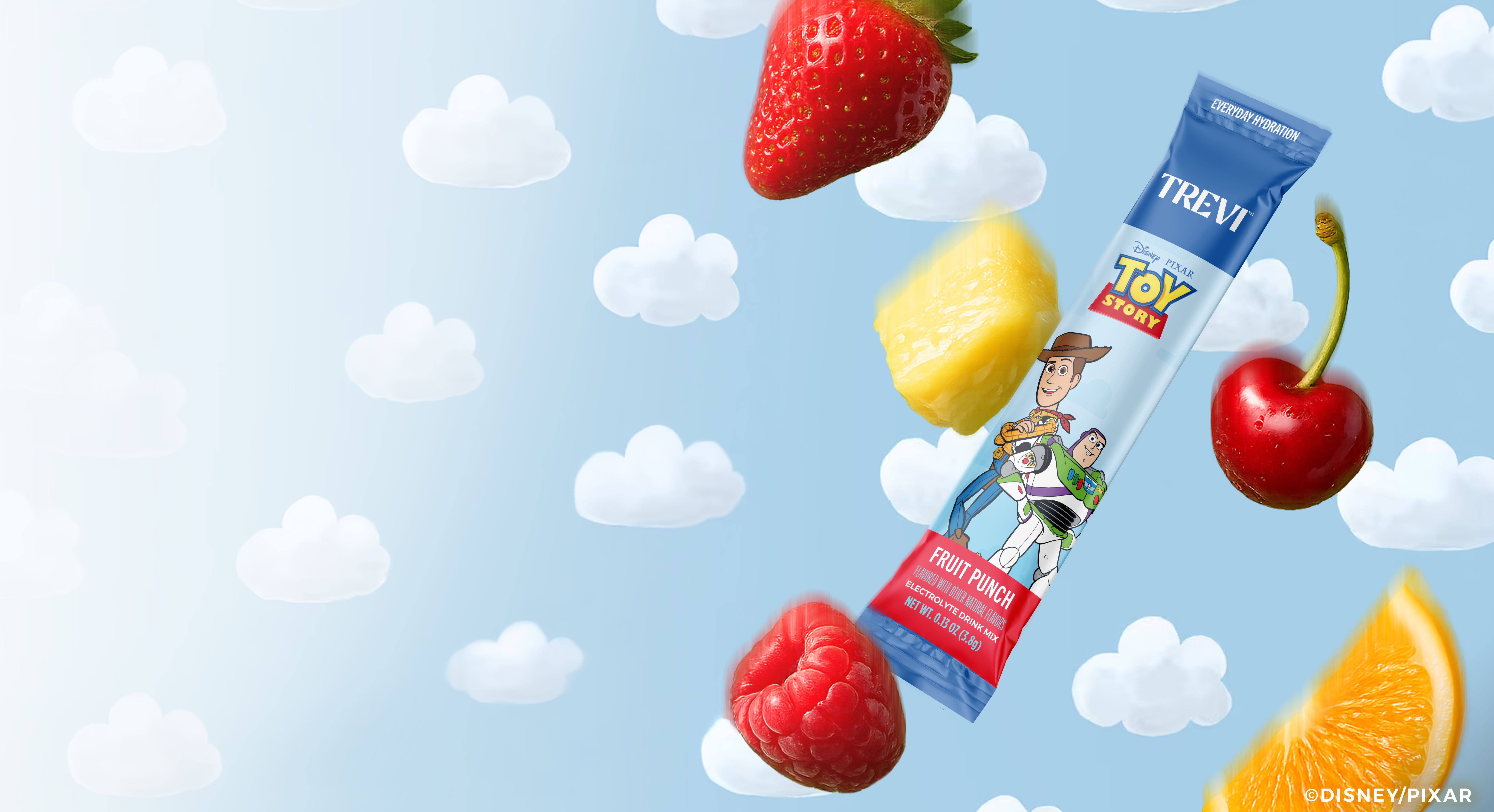 A Trevi Toy Story fruit punch drink mix packet floats in a cloudy sky with various fruits.