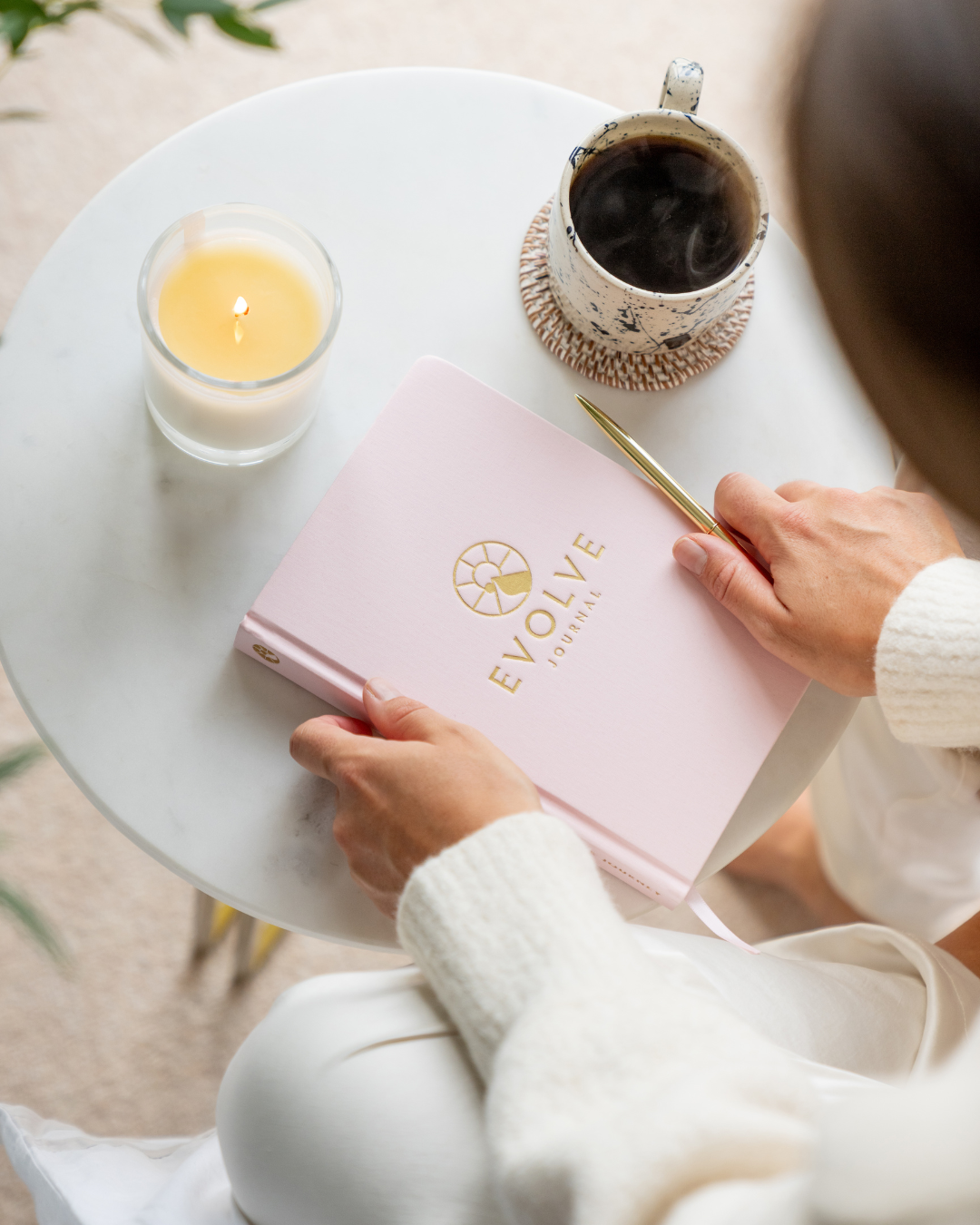 Green palm leaves against a white background.