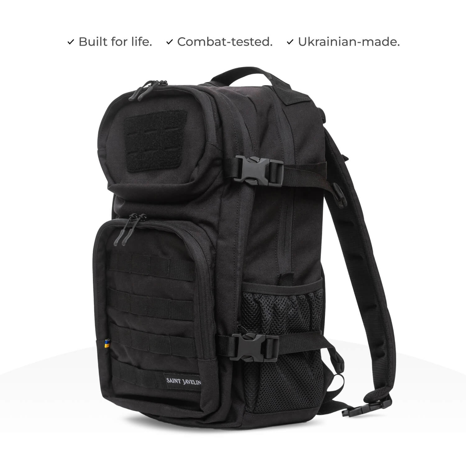 Black tactical backpack with multiple compartments and straps, displayed against a white background.