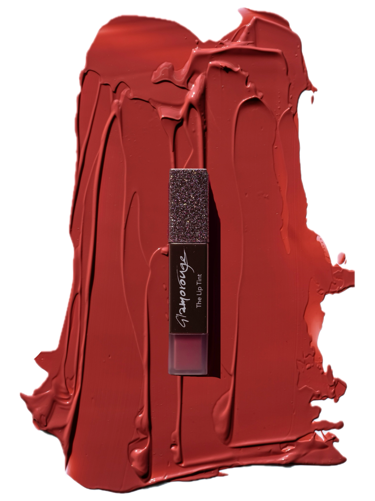 Red lip tint with glittery cap on smeared red background.