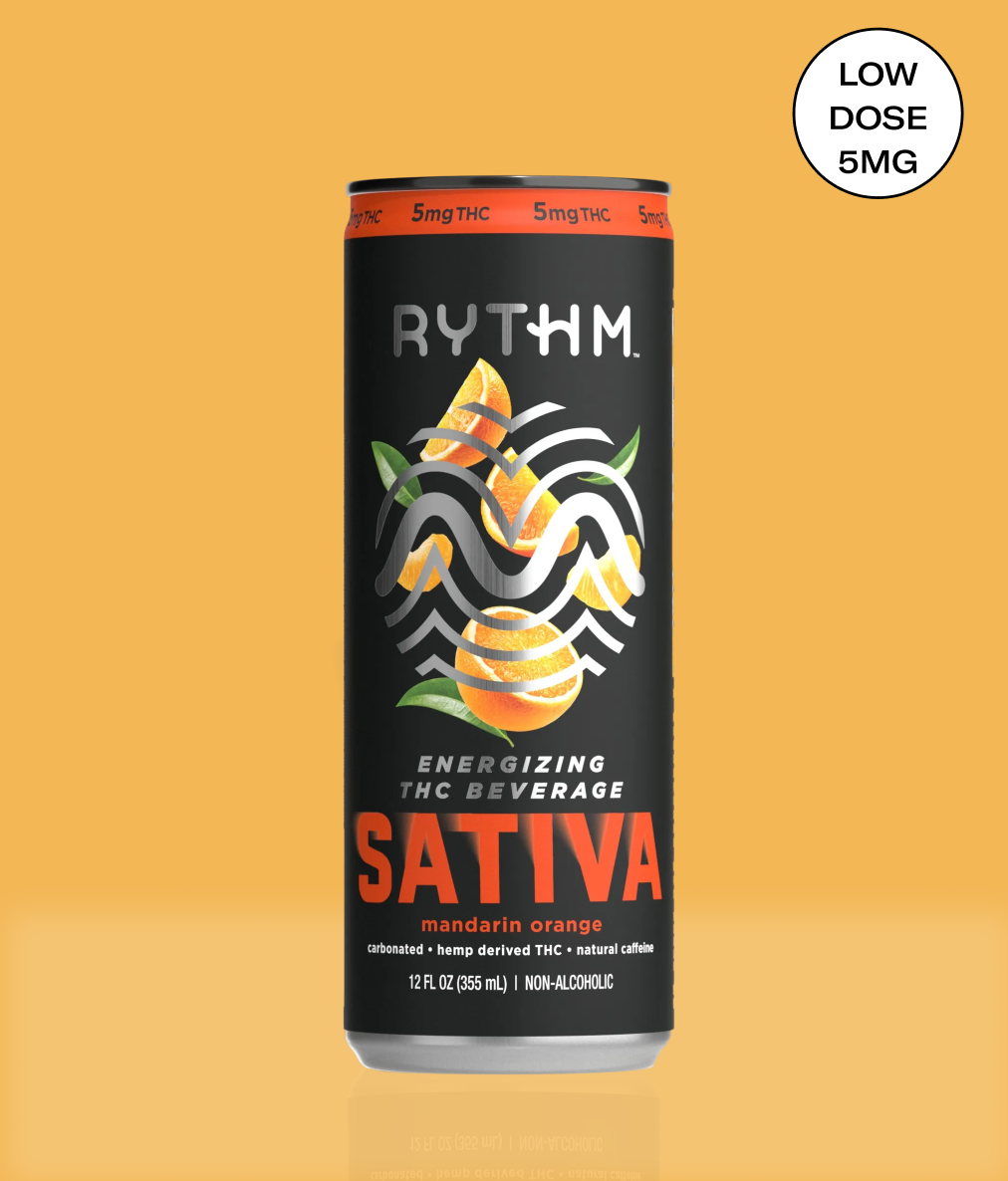 A can of RYTHM Energizing THC Beverage, Sativa Mandarin Orange flavor, against a solid orange background.