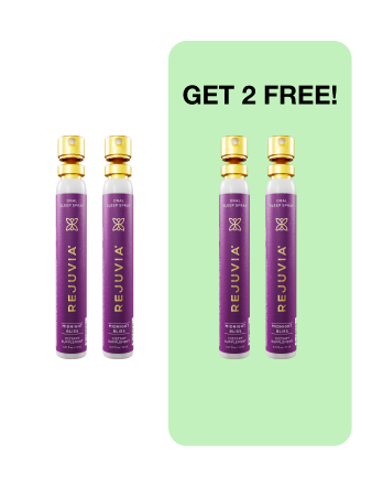 Two purple spray bottles with gold caps, text: 'Get 2 Free!'