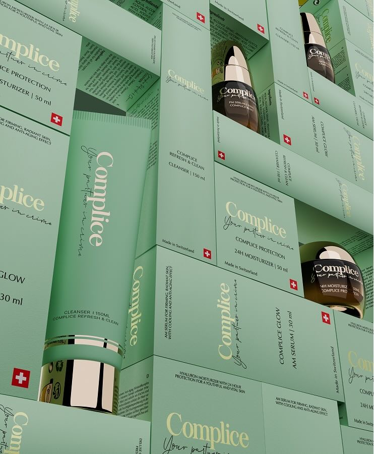 Green and brown skincare product packaging with 'Complice' branding and Swiss flag symbol.