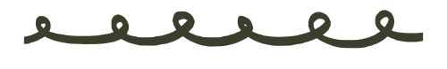A wavy, decorative line pattern in dark color on a transparent background.