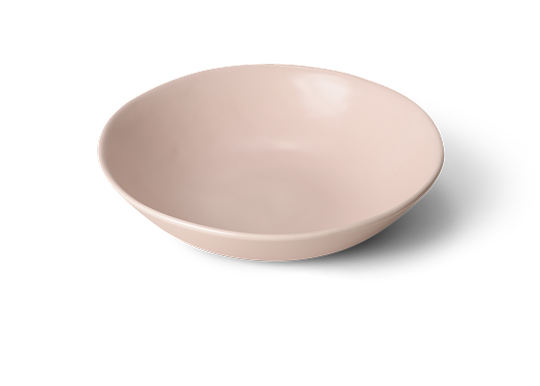 A plain, light pink ceramic bowl on a white background.