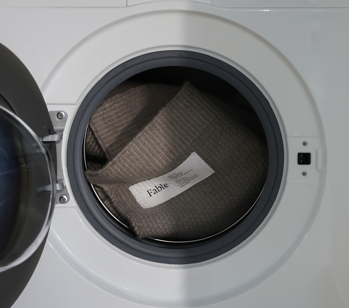 The Fable rug is in the washing machine