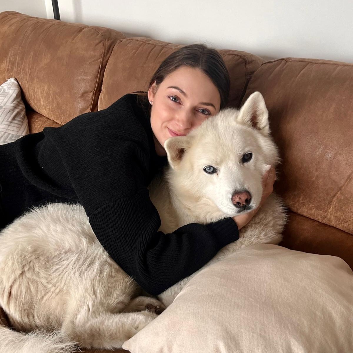 Founder Ellie and her husky, Romeo