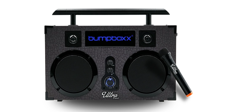 Black portable speaker with two large speakers and a microphone on the side.