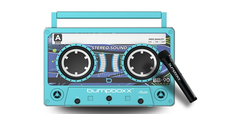 Retro-styled blue speaker resembling a cassette tape with a black microphone.