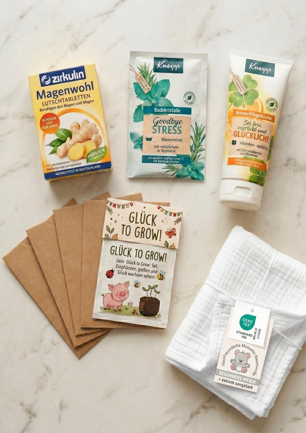 A collection of self-care products from a small bag, next to a coffee mug on a wooden table.