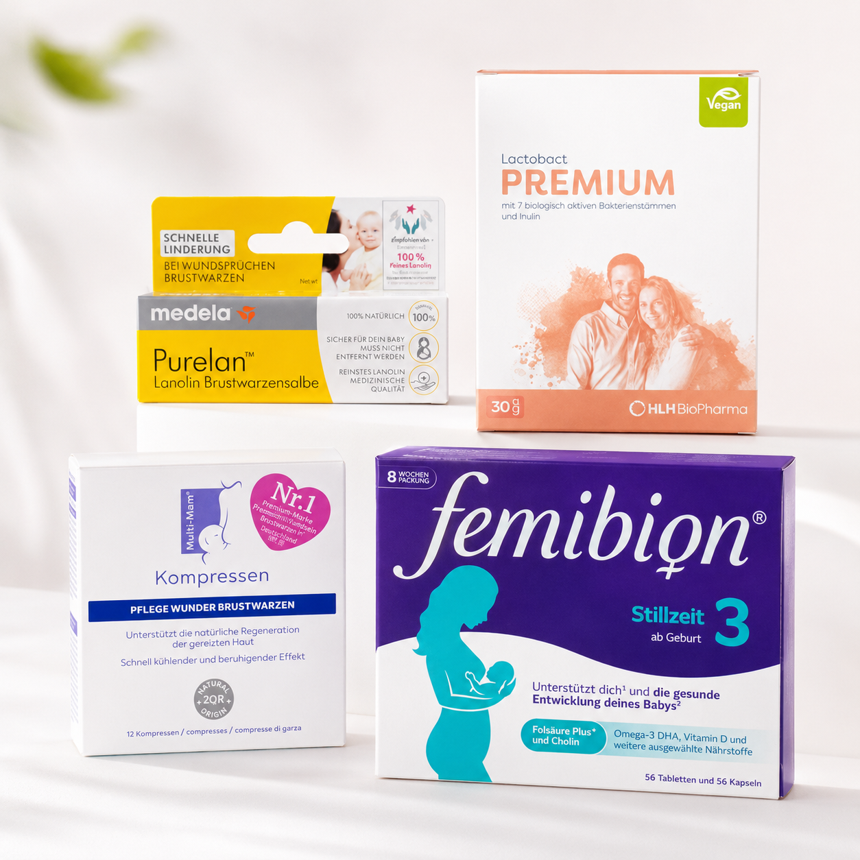 Boxes of Femibion and Folio nausema pregnancy supplements stacked on a wooden counter in a pharmacy.