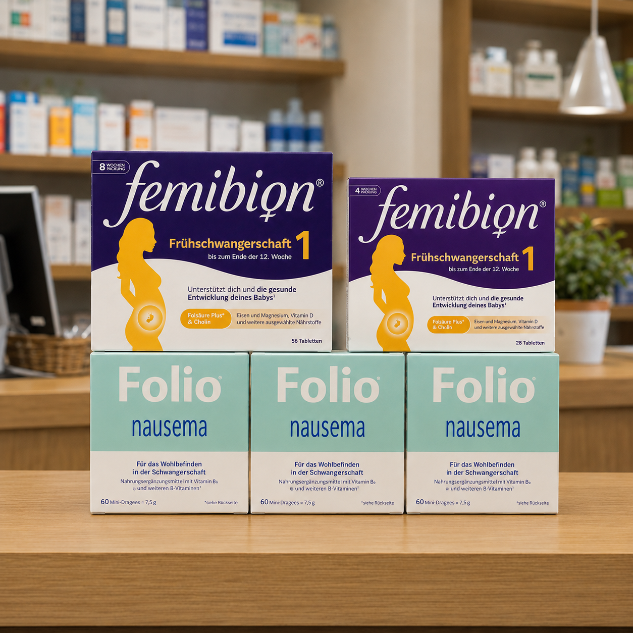 Boxes of Femibion and Folio nausema pregnancy supplements stacked on a wooden counter in a pharmacy.