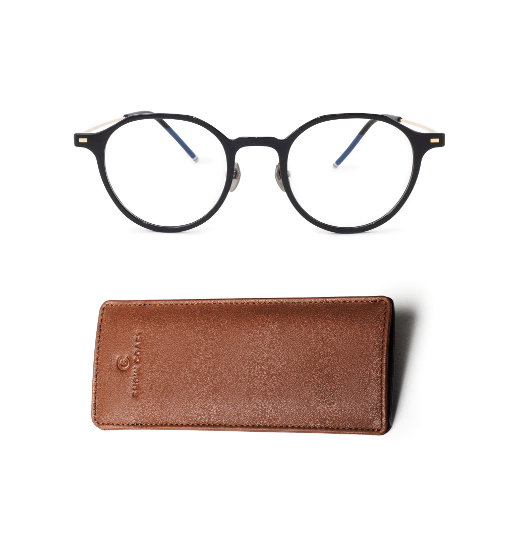 A pair of black, round-framed eyeglasses shown with a brown leather case on a white background.
